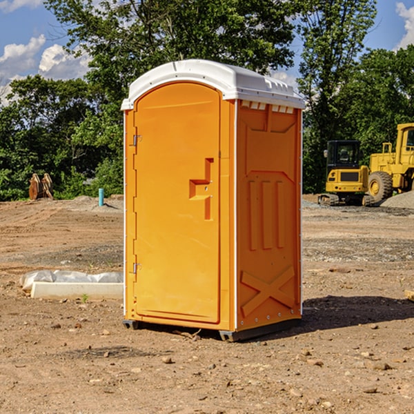 how often are the portable restrooms cleaned and serviced during a rental period in Gray